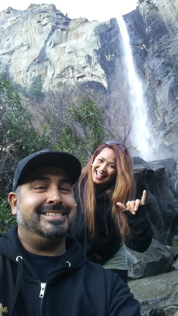  The foster family, the Casas, in front of a beautiful waterfall. 