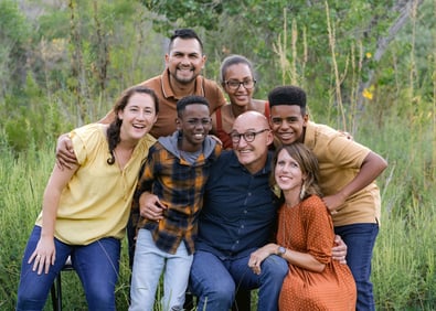 Angels Foster Family Network Resource Parents of the Month, Melissa & Justin, pose with their family.