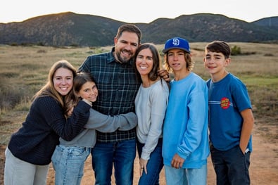 Carly and Kyle, Angels Foster Family Resource Parents, with their children