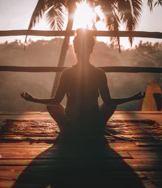 woman doing yoga as form of self-care